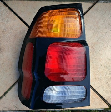 Mitsubishi Pajero Sport lampa lewy tył stanley