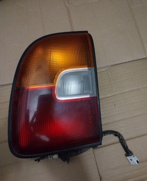 Lampa lewa tył Toyota RAV4 94-00