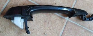 Oryginalna klamka zewnętrzna lewy tył BMW X1 E84