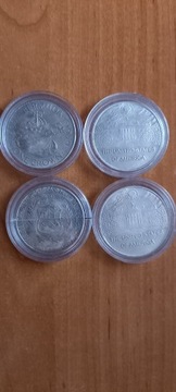 Cztery monety kolekcjonerskie