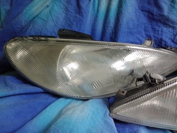 Lampa przód przednia prawa peugeot 206