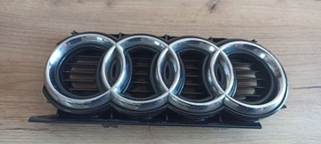 Emblemat Audi A4 B7 OEM przód 273mm