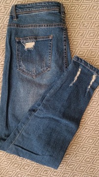 Spodnie jeansy z przetarciami 