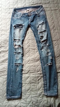 jeansowe spodnie z przetarciami L