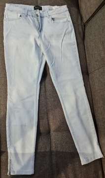 Damskie spodnie jeansowe Mohito r. 40