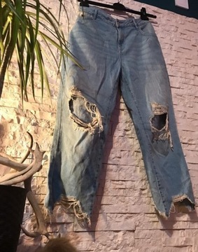 Jasnoniebieskie jeansy z Dziurami Reserved, 40/L