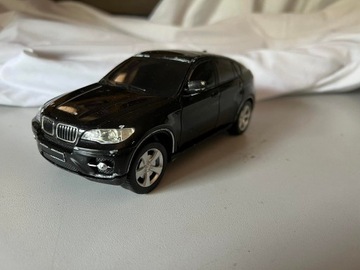 Samochód model czarny BMW X6 skala 1:24