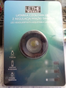 LED latarka czołowa z regulacją wiązki światła.