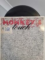 Monkeys touch winyl