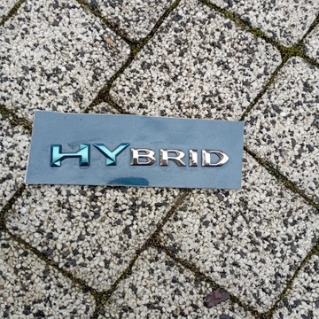 Emblemat hybrid peugeot