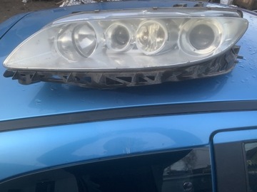 Reflektor Lewy Mazda 6