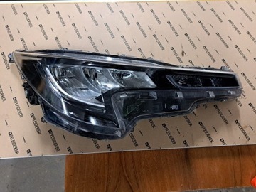 Lampa prawa  reflektor Toyota corolla E21 90119224