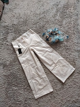 Luca d'altieri spodnie białe M nowe 