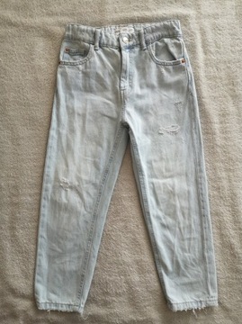 Strzępione spodnie jeansy z dziurami Zara 134