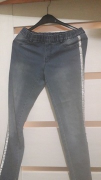 spodnie jeansy rozmiar 158 ze srebrnymi lampasami 