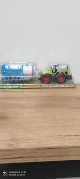 Traktor z maszyną rolniczą Beczkowóz 