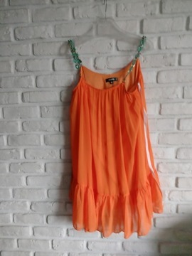 Piękna pomarańczowa sukienka 