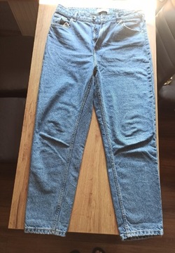 Spodnie damskie jeansy Reserved r.42