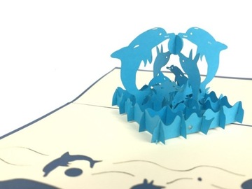 Kartka 3D Zwierzęta Delfiny bawiące się piłką