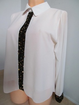 Biała elegancka koszula z czarno-złotymi elementam