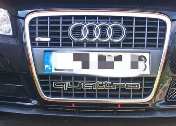 Audi Quattro emblemat  nierdzewka