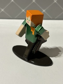 Minecraft metalowa figurka Alex żelazny miecz jada
