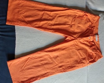 Spodnie damskie pomarańczowe.