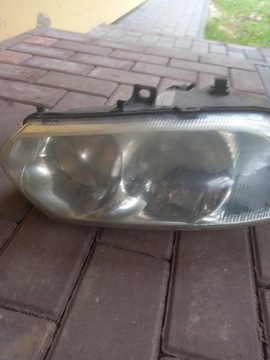 Lampa lewa 60620135 Alfa Romeo 156