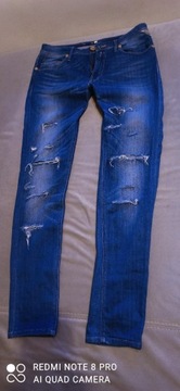REPLAY  spodnie  damskie W30, L32  ,modne  dziury 