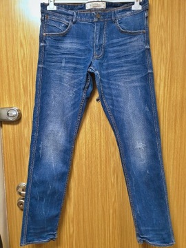 Męskie jeansy Reserved W32L32