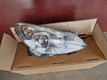 LAMPA REFLEKTOR PRAWY Opel Corsa D  13186382