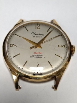 Złoty 18k. szwajcarski zegarek mechaniczny Fleuron