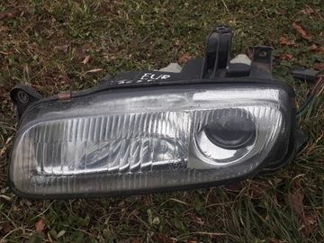 Lampy przód lewa prawa Mazda 323f BA KOITO