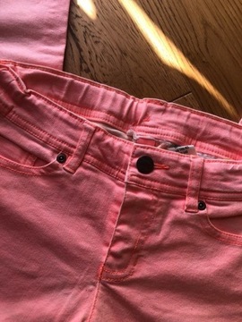 różowe spodnie dziecięce h&m 146