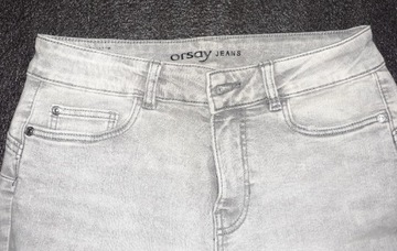 Jasnoszare jeansy 7/8 z przetarciami ORSAY 34/XS