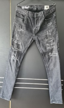 Czarne spodnie jeansy z przetarciami slim Denim Co