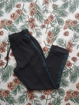 Czarne spodnie damskie z lamowka Reserved r. M