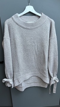 Sweter sweterek z kokardkami beżowy