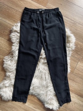 czarne szyfonowe spodnie xs reserved wstawki