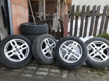 Oryginalne felgi aluminiowe NISSAN 15" z oponami