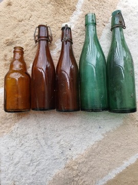 Szklane butelki z okresu PRL