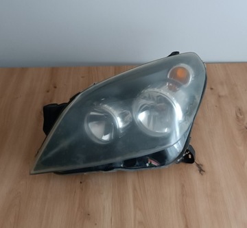 OPEL ASTRA H LAMPA REFLEKTOR LEWY EUROPA