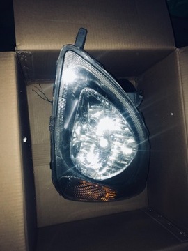 Lampa przednia lewa toyota yaris I przed lift