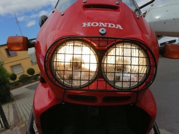 Osłona lampy przedniej, AFRICA TWIN 750 RD 07A /04