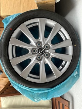 Felgi 18 Mazda NOWE oryginalne + opony Bridgestone