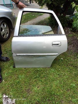 Drzwi Opel Vectra-B lewy tył srebrne