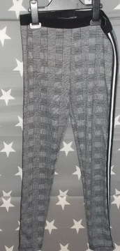 Eleganckie spodnie z lamówką, 158