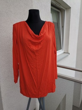 MsMode, pomarańczowa bluzka z fikuśnym dekoltem.