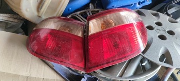 Lampy tyle almera prawa lewa sedan n16 klapa nissa