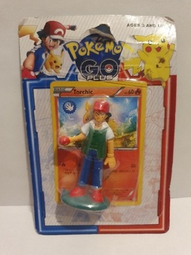 Karta Pokemon Torchic plus figurka Ash Ketchum 